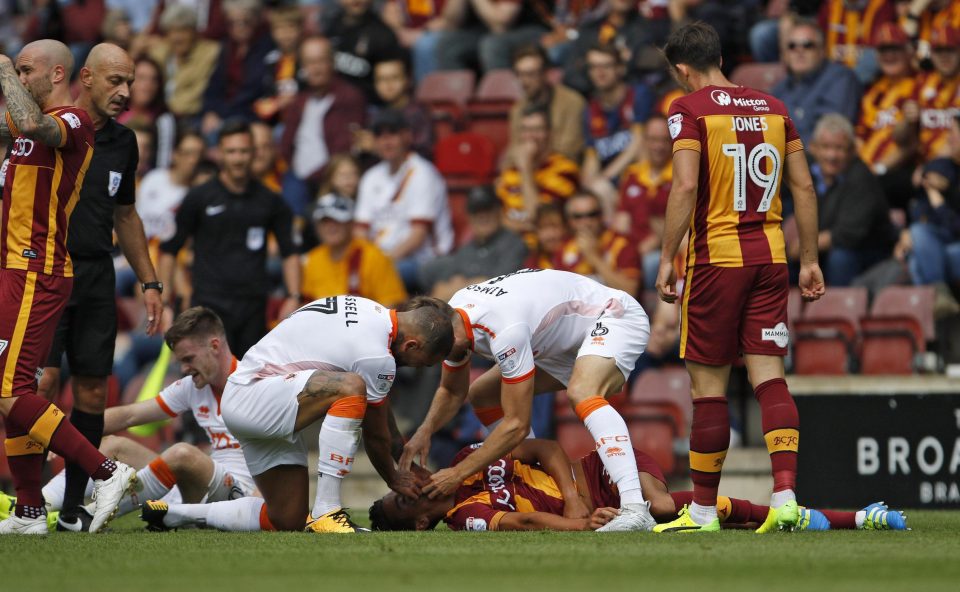  The Blackpool players then soon realise the seriousness of the incident at hand, and place Adam Chicksen into the recovery position