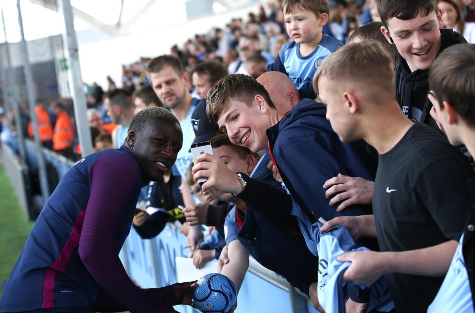  Former Monaco star Benjamin Mendy poses for picture with Manchester City fans