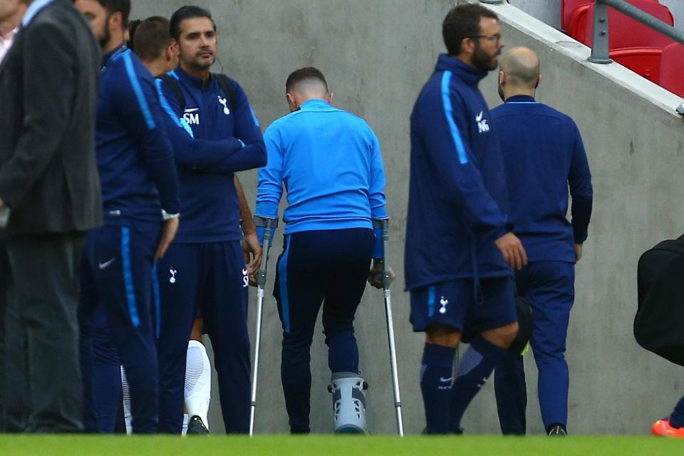  Kieran Trippier was then pictured hobbling around on crutches during the game