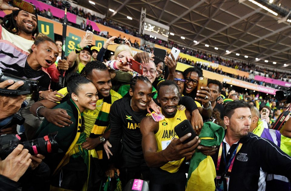  Usain Bolt refused to let his defeat spoil his lap of honour as he greeted fans