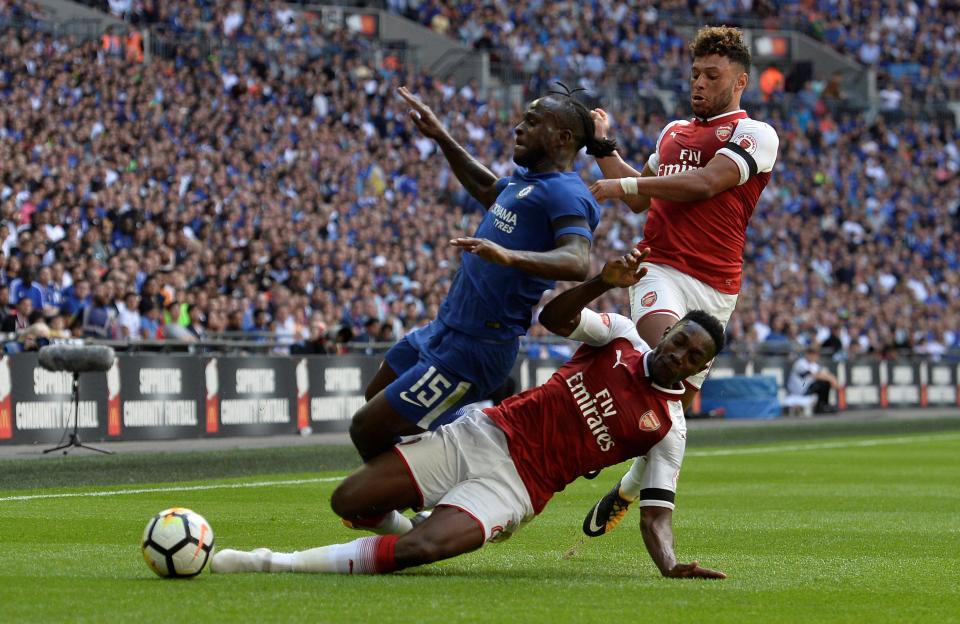  Victor Moses in action against Arsenal's Danny Welbeck at Wembley