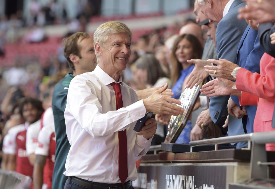  Arsene Wenger and his side have claimed the first piece of silverware this season