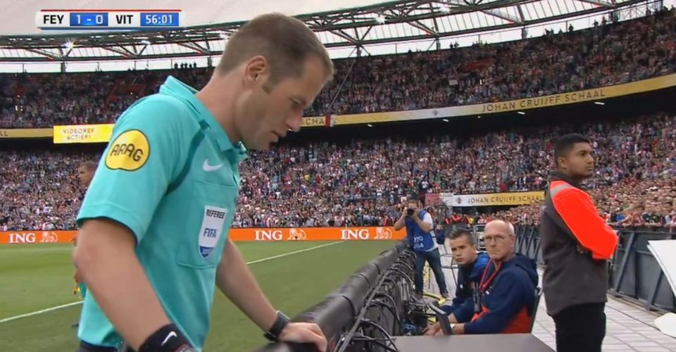  Danny Makkelie studies the replays before disallowing a Feyenoord goal and awarding Vitesse a penalty in the Dutch Super Cup