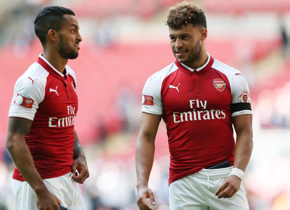  Theo Walcott and Alex Oxlade-Chamberlain after winning the Community Shield