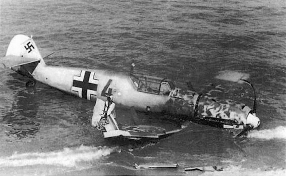 A Nazi plane pictured here in the sea after being brought down during the fighting