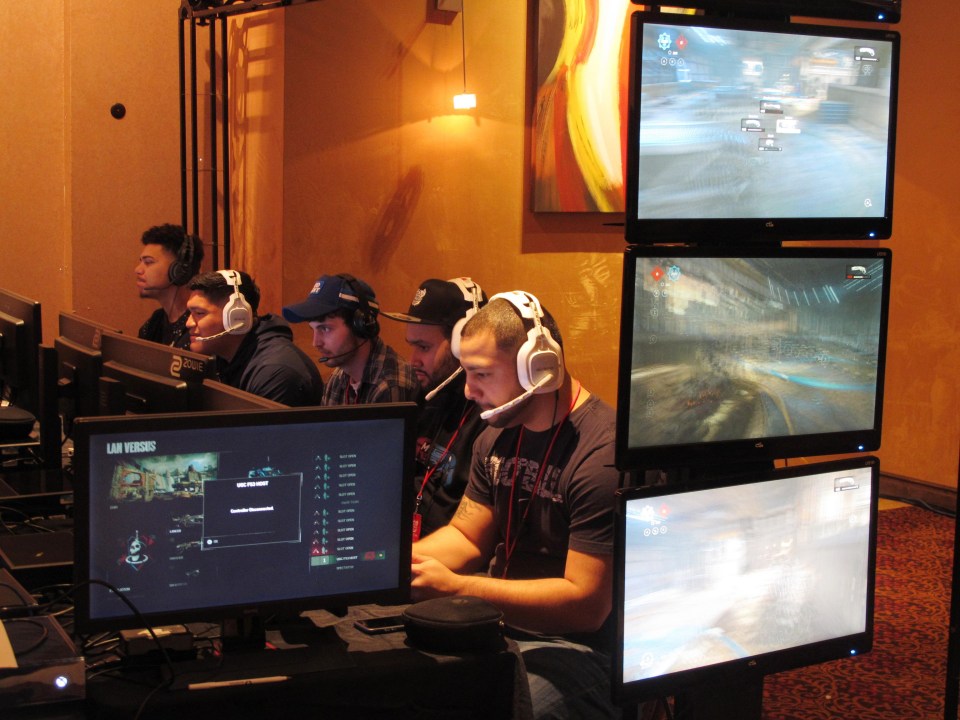 Video gamers compete against one another in an esports tournament at Caesars casino in Atlantic City