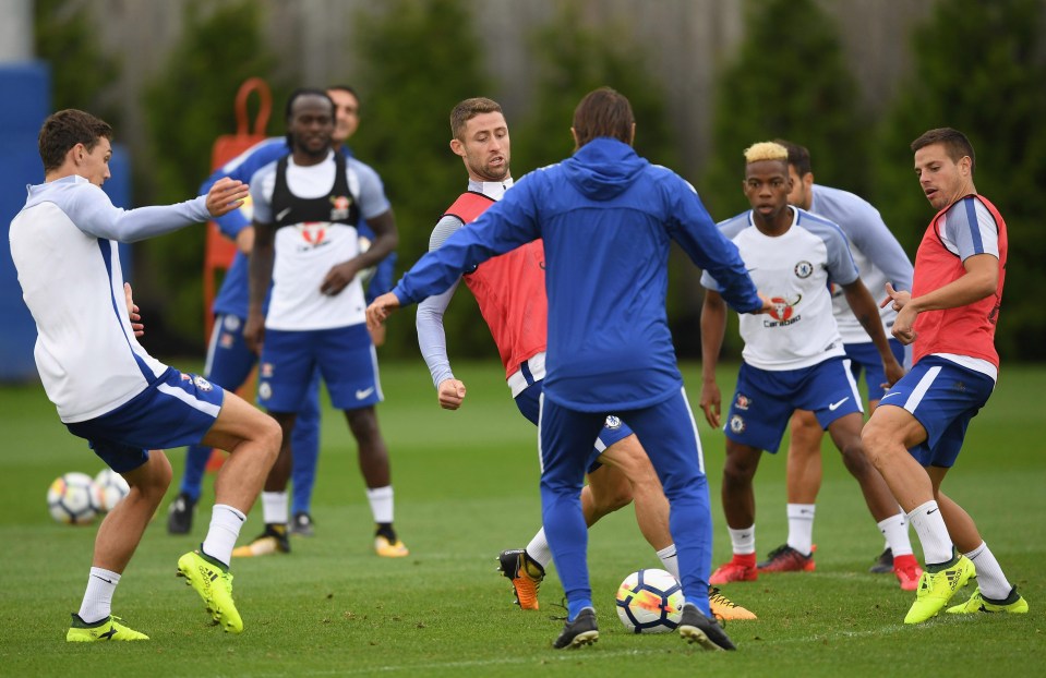 The Blues chief gets involved with the session at Cobham Training Centre