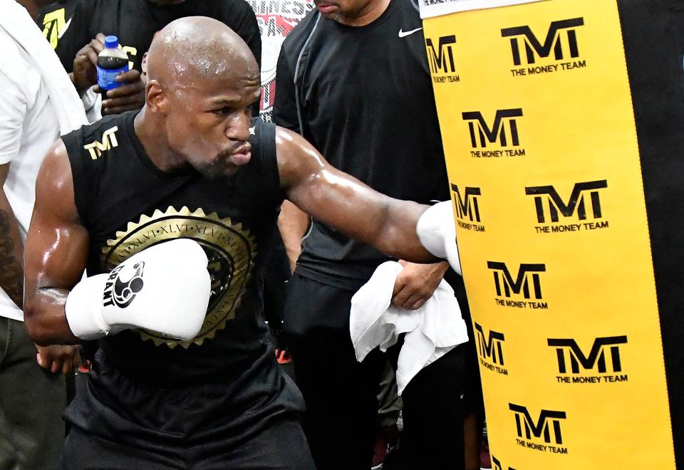  Mayweather does some traditional heavy bag work ahead of the Las Vega mega-fight