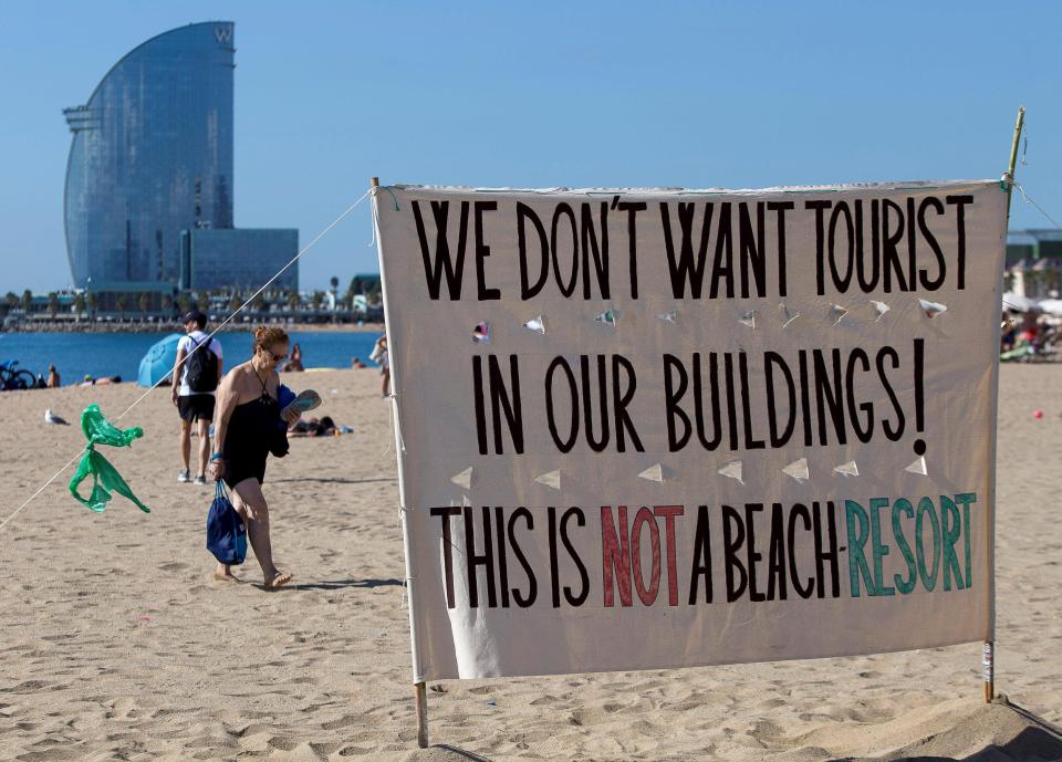  A banner displayed on a beach in Barcelona