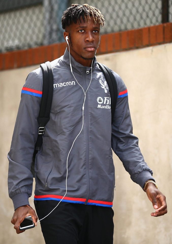  Crystal Palace winger Wilfried Zaha will be out for four weeks with a knee injury