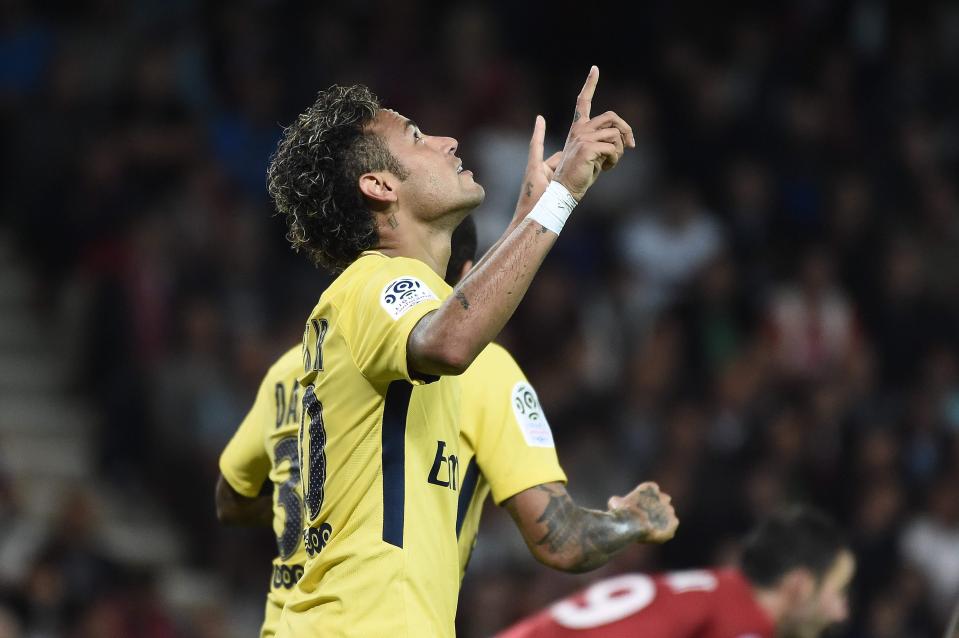  Neymar celebrates after scoring to make it a dream debut