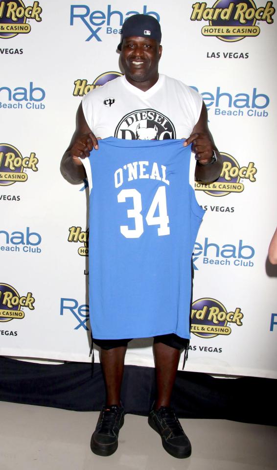  Shaquille O'Neal posed with a basketball jersey at the event in Las Vegas