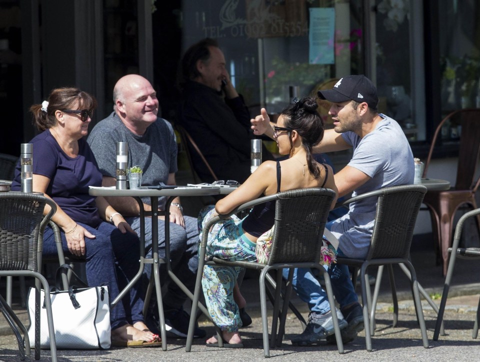 Michelle appeared happy and relaxed as they soaked up the sunshine