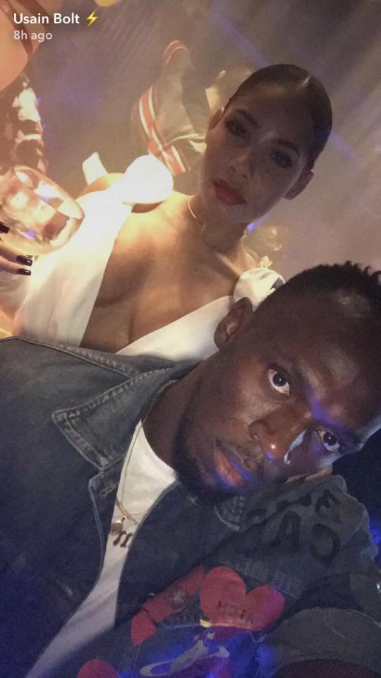  Party people . . . Usain Bolt and Kasi Bennett