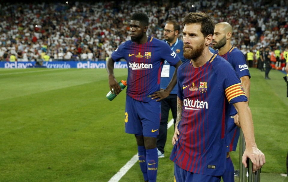 Lionel Messi and Barcelona players look on after defeat in Spanish Super Cup