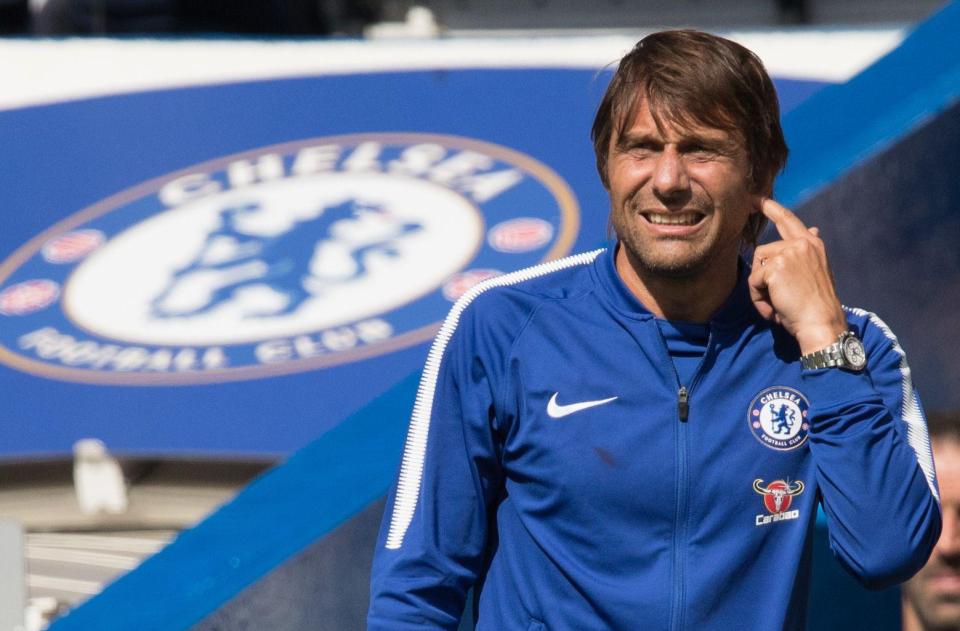  Antonio Conte was forced to wear a club tracksuit against Burnley because he lost his suit