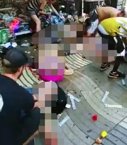  The dead and injured can be seen on the floor in the shocking video