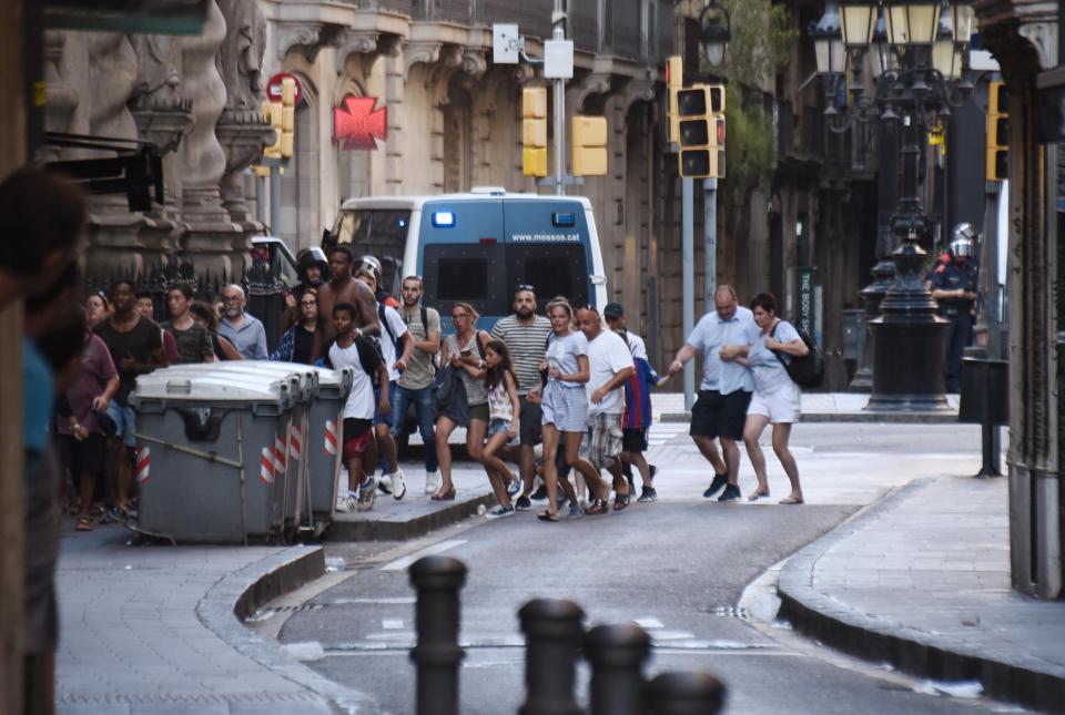  Crowds of people fled the site of the harrowing attack