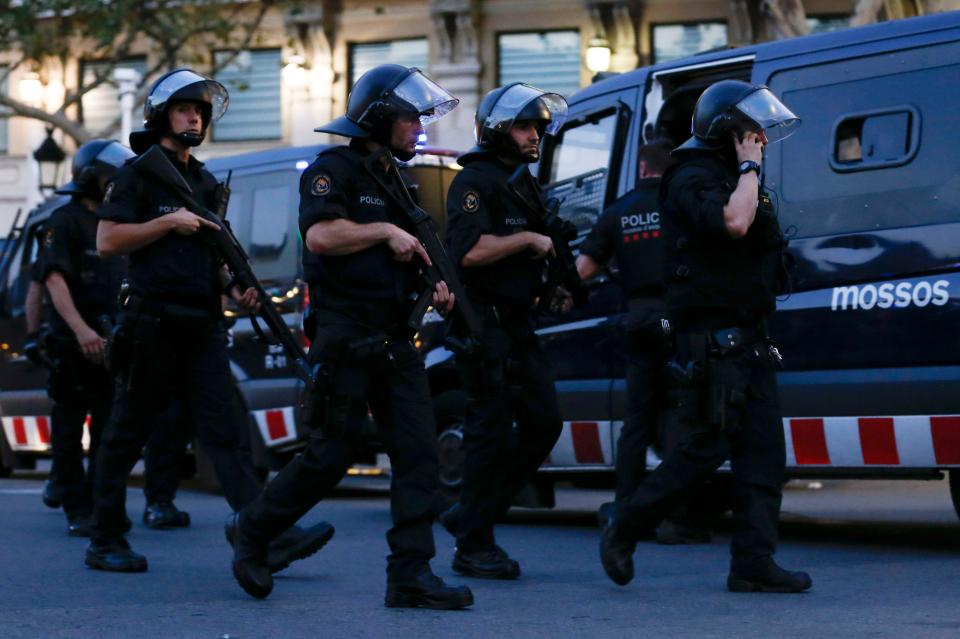  Armed cops pictured in the Catalan capital