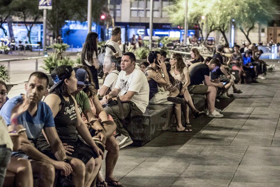  People gather in the Las Ramblas area waiting for updates from authorities