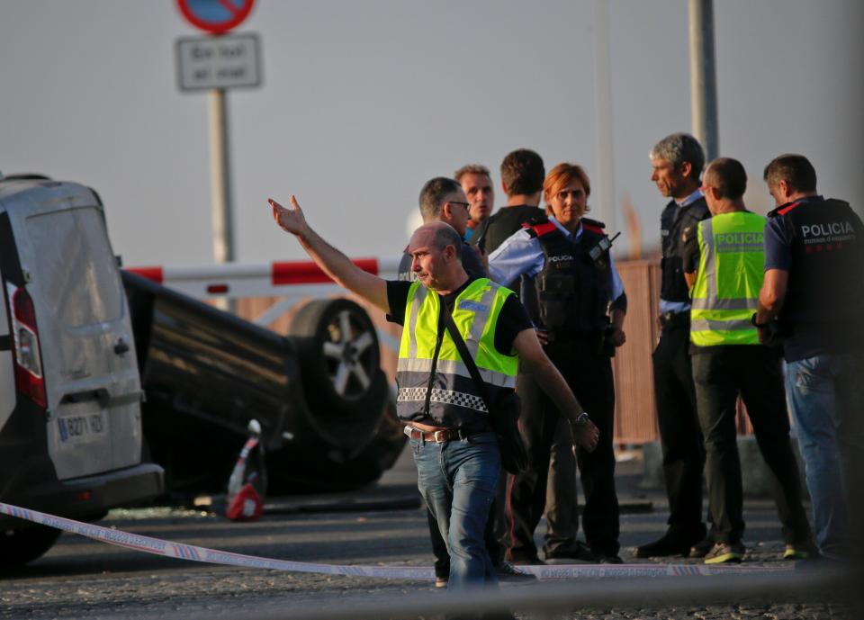  Seven people were injured when five terrorists rammed an Audi A3 into crowds in Cambrils before flipping it