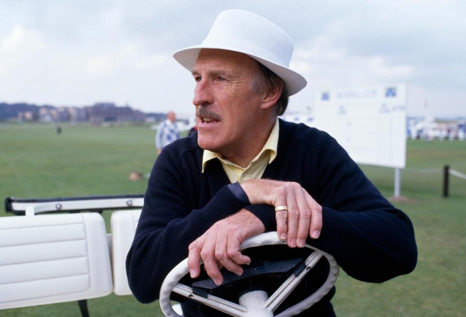  Sir Bruce Forsyth driving a golf buggy in 1987