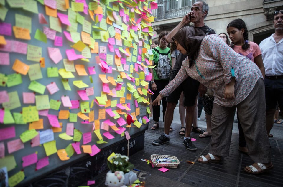  Messages are left on the wall of a building on Las Ramblas