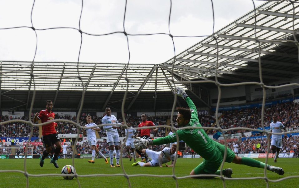  Substitute Anthony Martial fires the third of three United goals in four minutes to seal their 4-0 victory at the Liberty Stadium