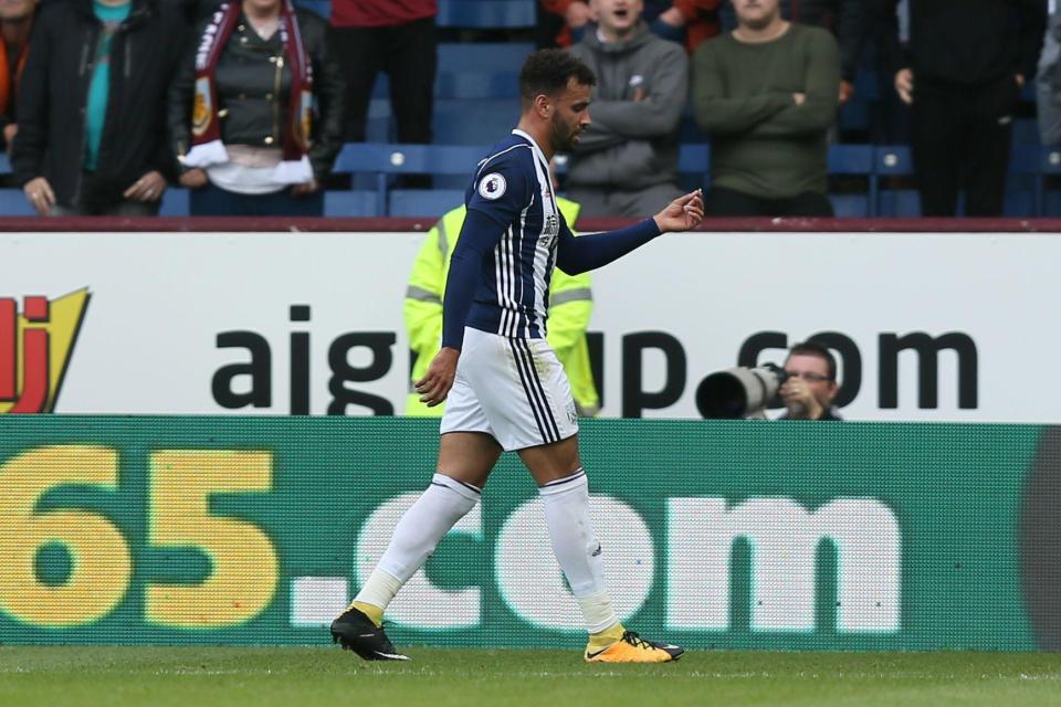  Hal Robson-Kanu leaves the field after being given his marching orders