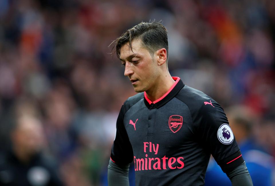  Mesut Ozil and Arsenal will learn their Europa League group stage fate