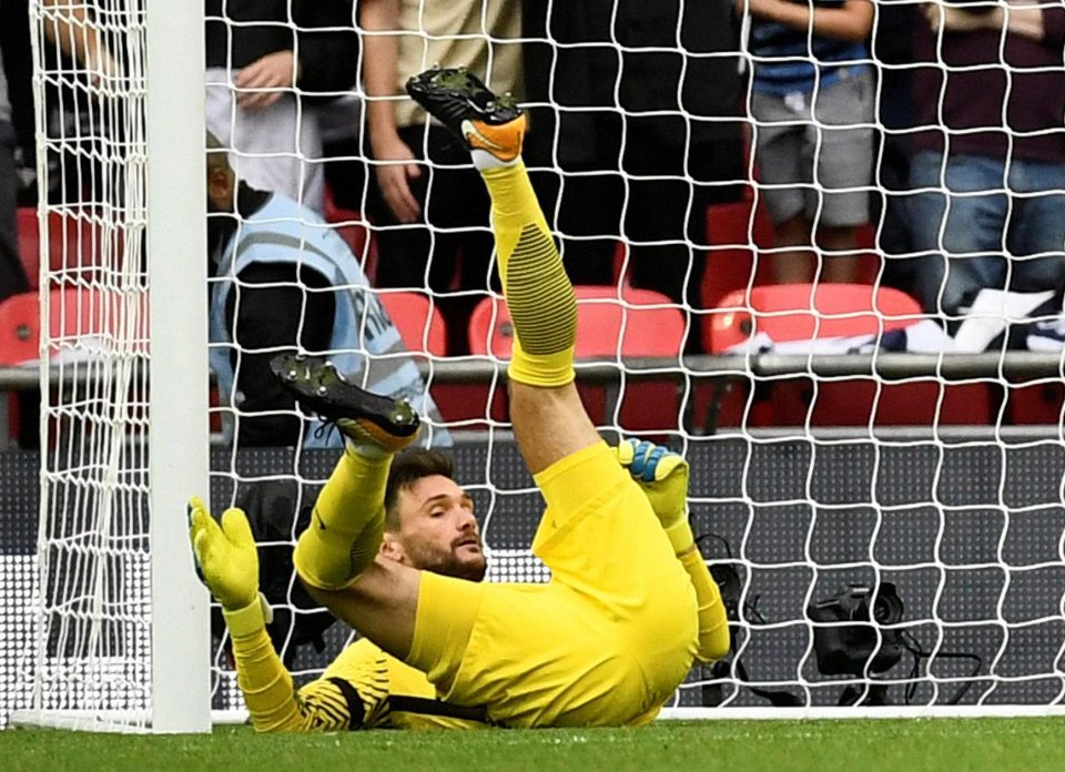  Lloris ends up in a heap with the ball in the net for the Chelsea winner