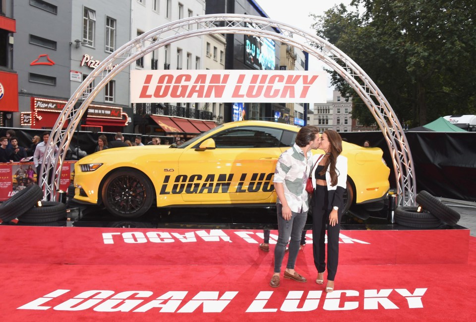 They shared another smooch in front of a huge car at the film event