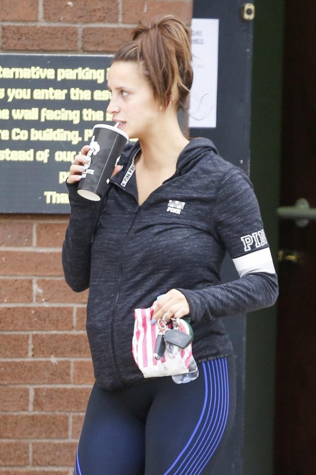 Ferne showed off her baby bump in a tight hoodie and blue leggings