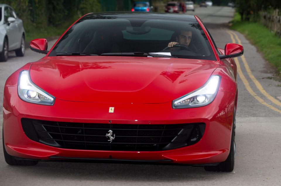  Henrikh Mkhitaryan's flashy Ferrari won't be picking up any bumps or scratches on his way to work anymore