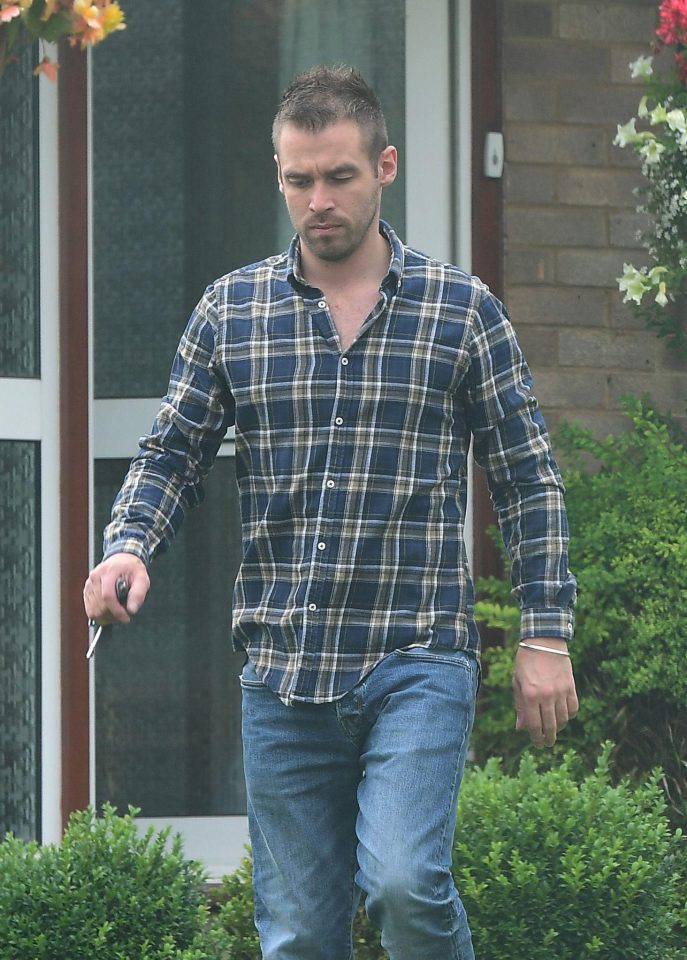  Aaron Lacey leaves home after the nation was shocked by his girlfriend Sarah Harding's undercover antics