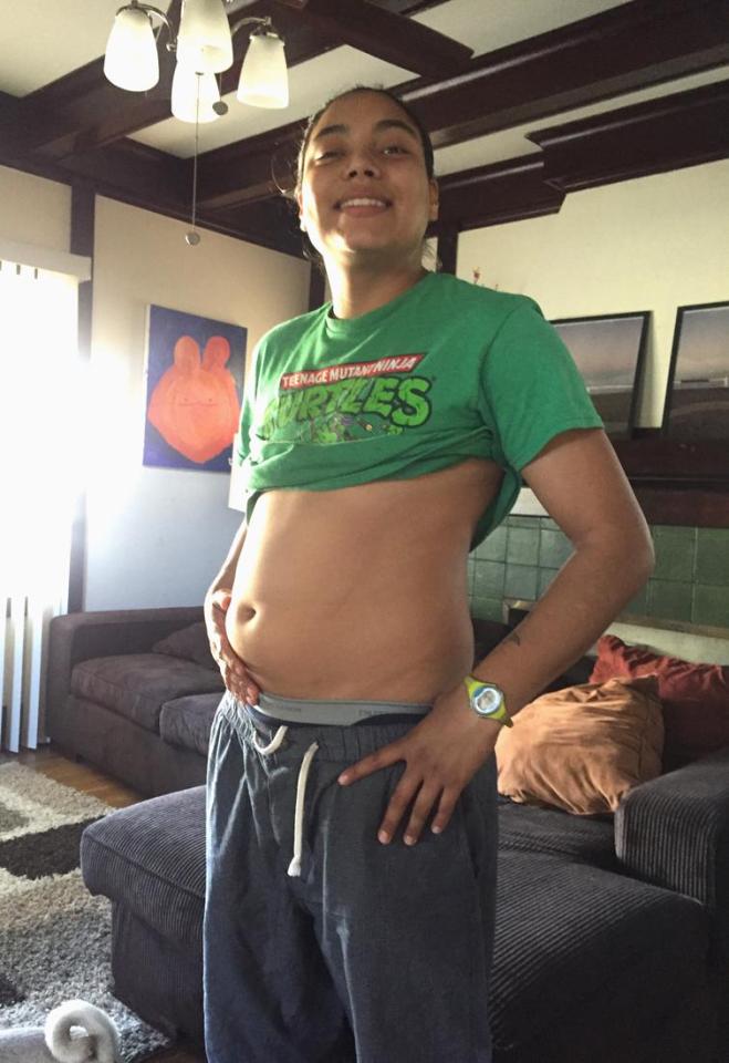  Alex Alvarez, 25, pictured at four months pregnant, is expecting his first child and plans to raise him or her gender-free