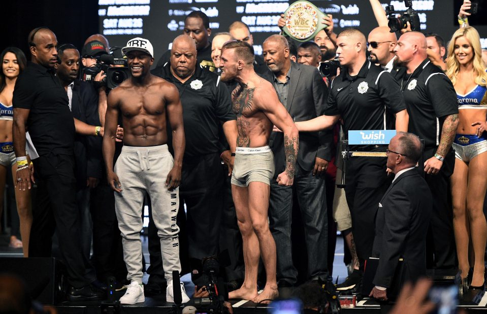  Conor McGregor steps forward for the face off with Floyd Mayweather