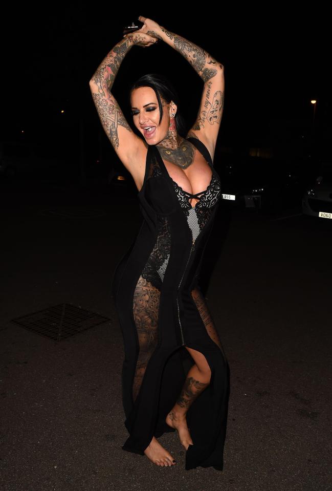  She was the life and soul of the party as she struck a pose on the street