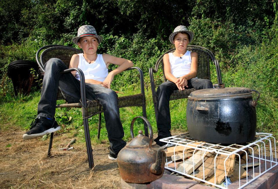  The boys can light the fire and cook a meal in their great-granny's iron pot