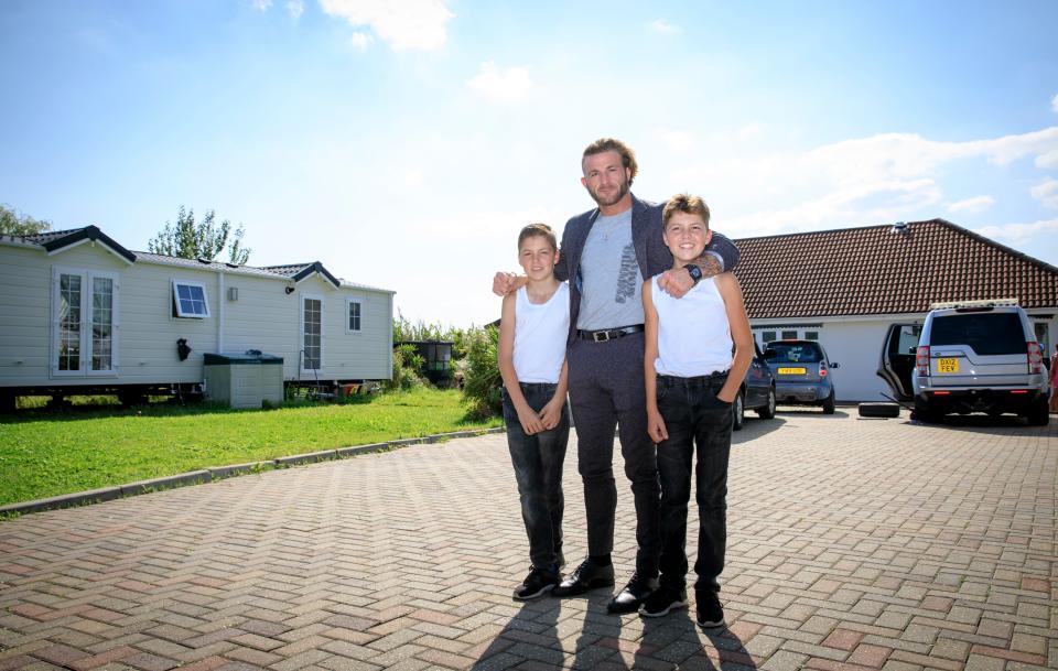  Abraham, Tony and Johnny in the driveway of Five Oaks Farm, which has been in the family for 29 years