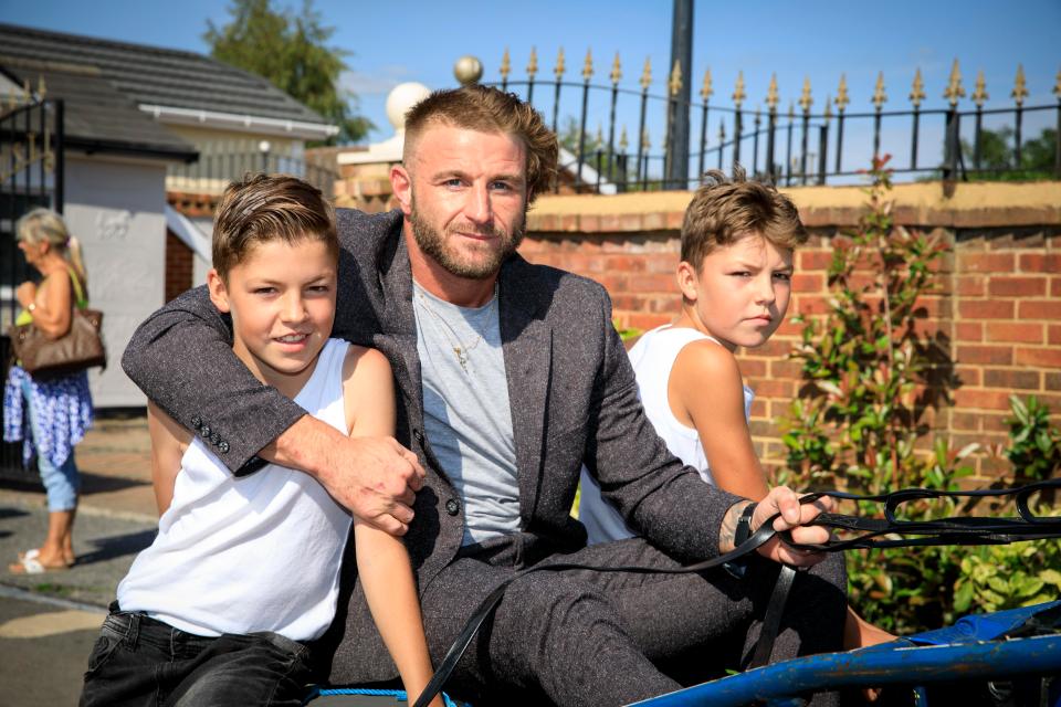  The twins with their uncle Tony Giles, a champion cage-fighter who trains them to fight