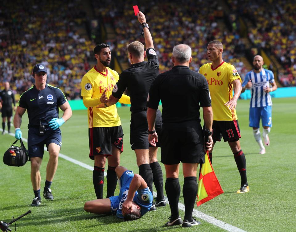 Miguel Britos is shown straight red card for terrible two-footed lunge