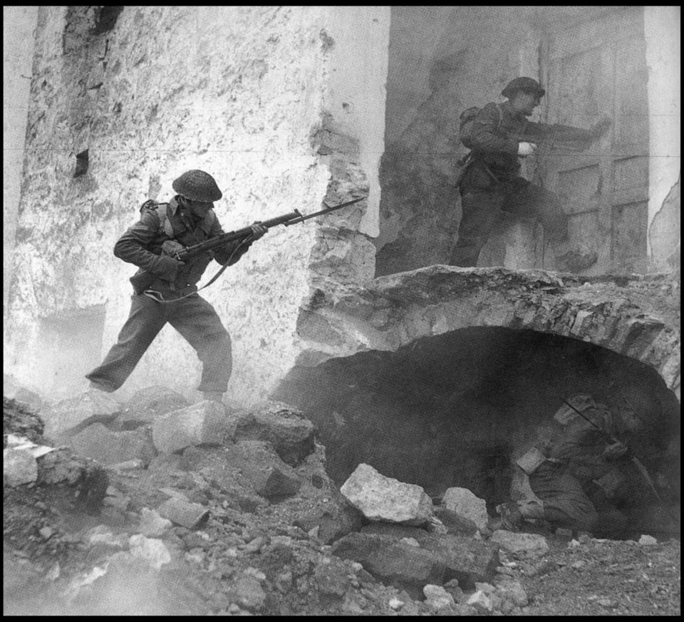  New Zealanders charge into a ruined house as confusion and violence grips the street-by-street offensive to capture Monte Cassino