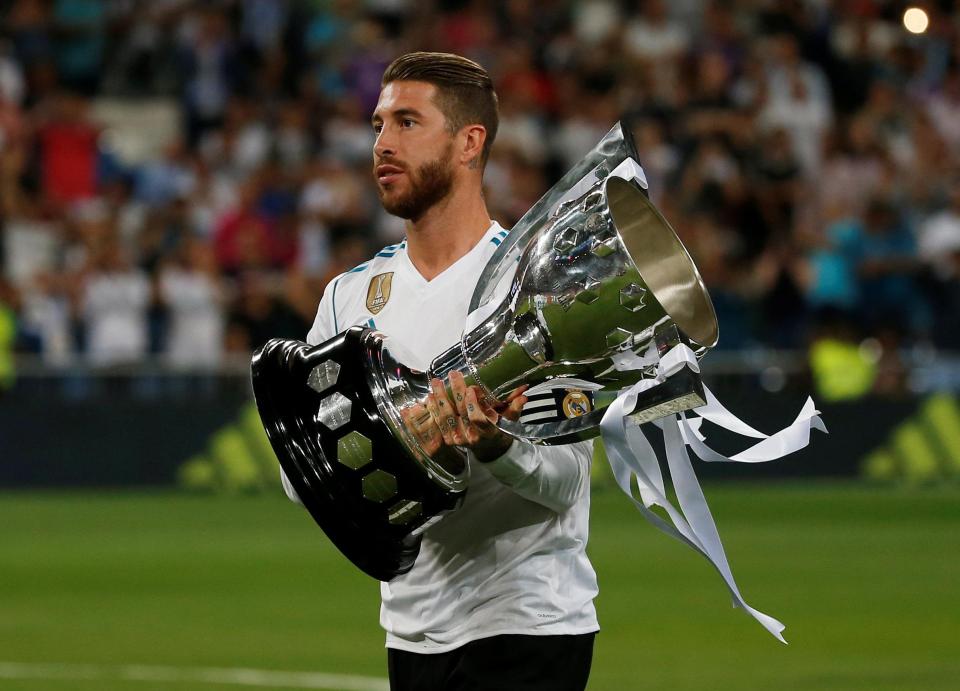  Skipper Sergio Ramos shows off the La Liga title before their match against Valencia