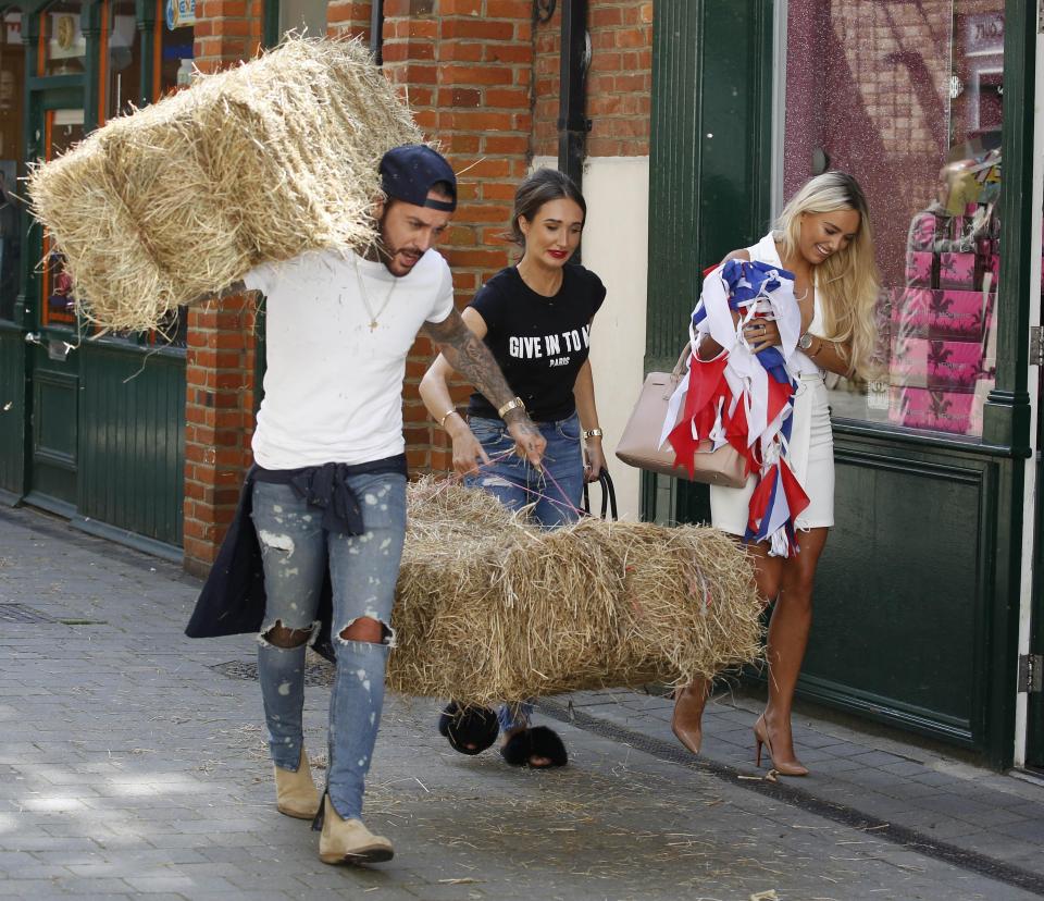  Megan helped Pete with the hay while Amber carried flags