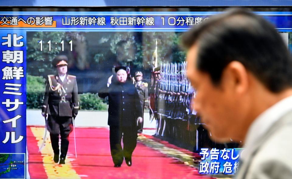  Screens in the Japanese capital were full of images of the North Korean leader as the country woke to news of the missile launch