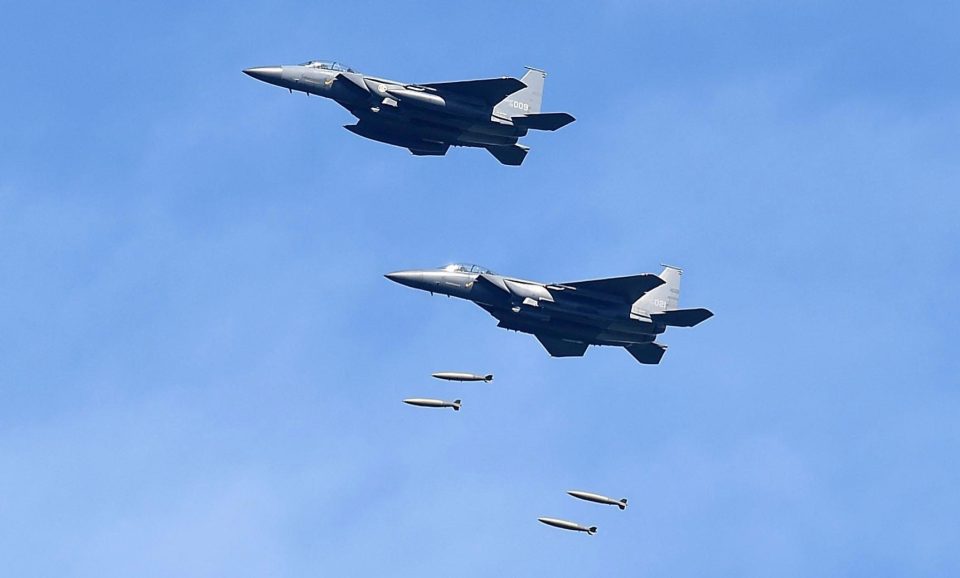  Four 5-15K fighter jets dropped eight MK-84 bombs on targets at a military field near the border