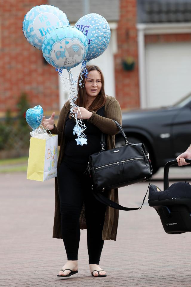  Chanelle carried a large bunch of balloons and gift bag into her house