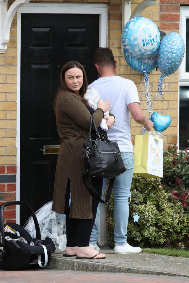  The couple were laden with blue balloons and gifts from well wishers