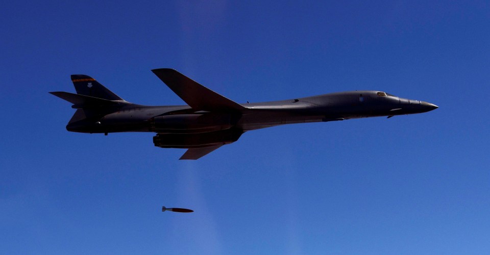 A US Air Force B-1B drops a MK-84 as it flies over South Korea during the joint military drill